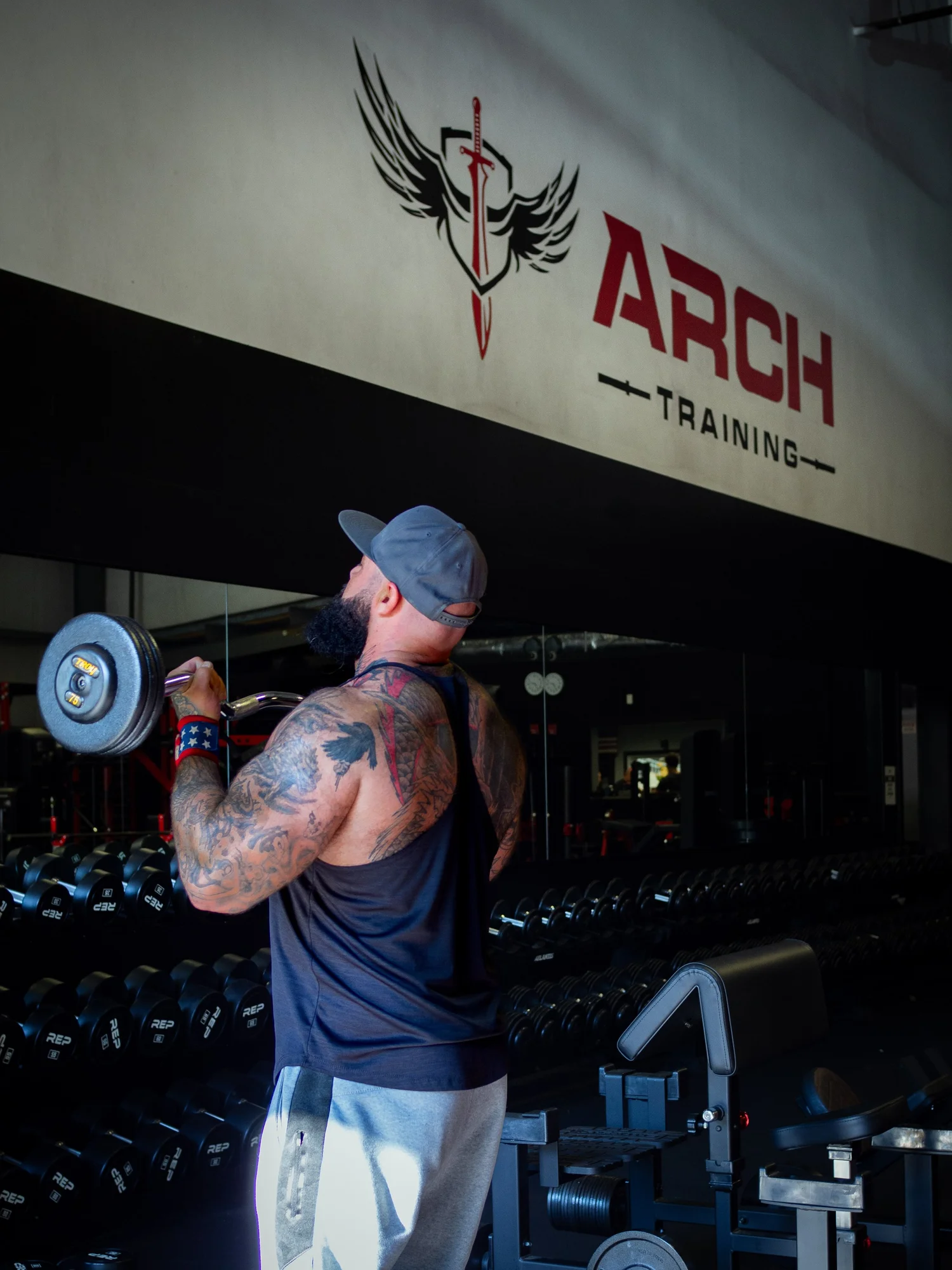 Cable machines, dumbbell racks, and squat racks at ARCH Training Marlboro